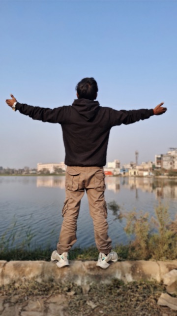 Vansh Kashyap outdoors by the water